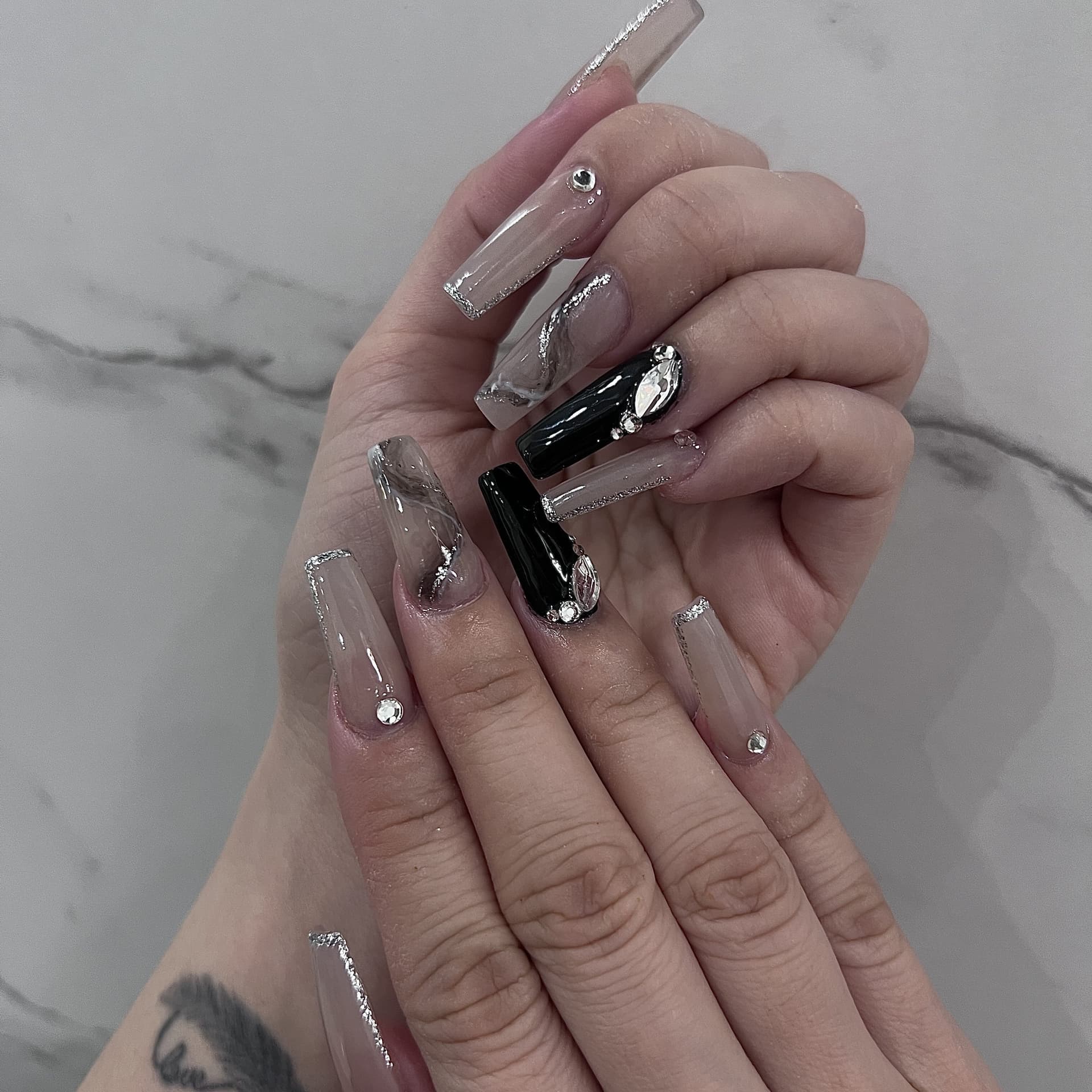Luxury chrome and rhinestone nail art
